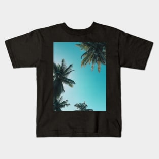 Blue sky and palm trees Kids T-Shirt